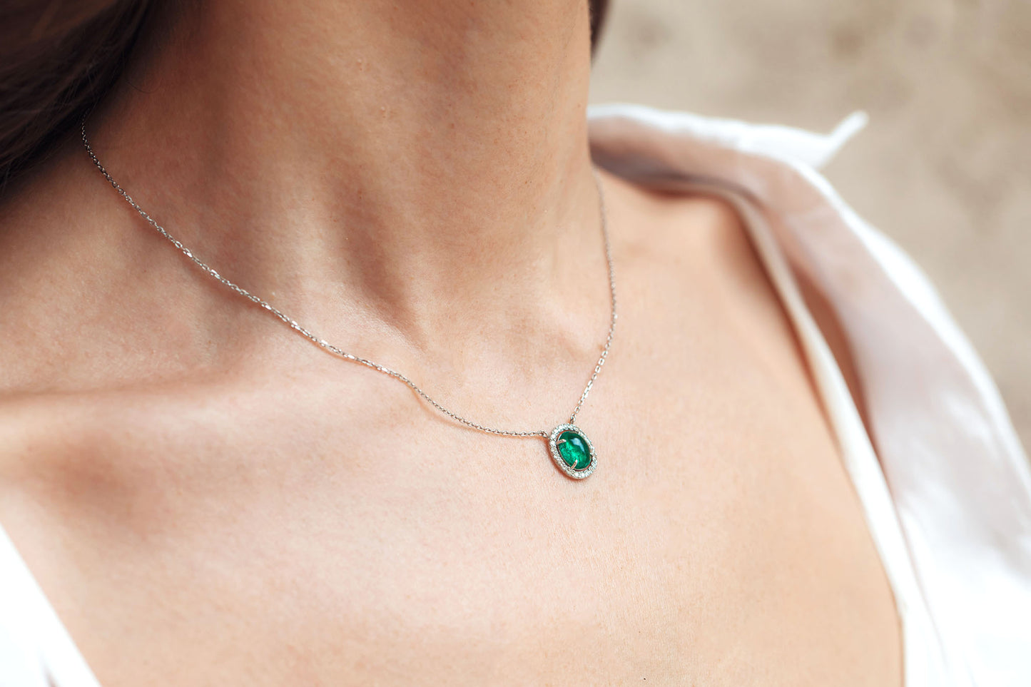 Oval Emerald and Daimond Halo Necklace