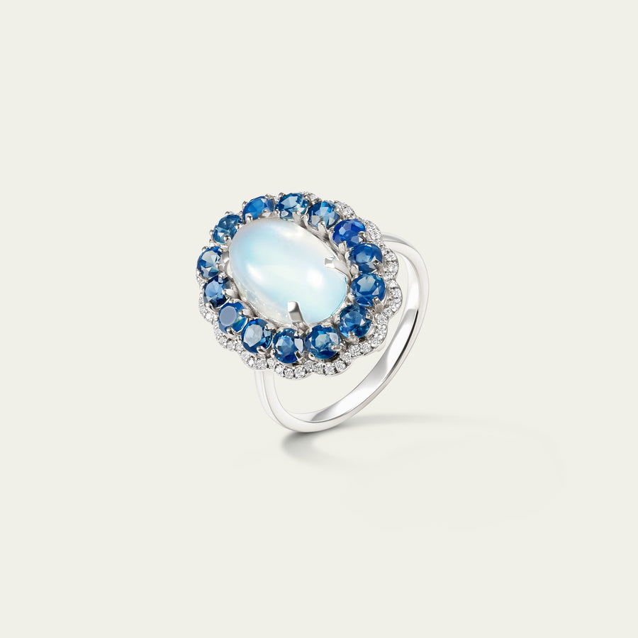 Marigold Moon Ring in 18K white gold, set with blue sapphire and moonstone and diamond