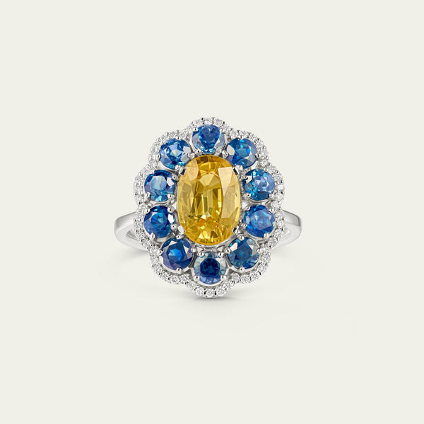 Marigold Hero I Ring in 18K white gold, set with blue and yellow sapphire and diamond