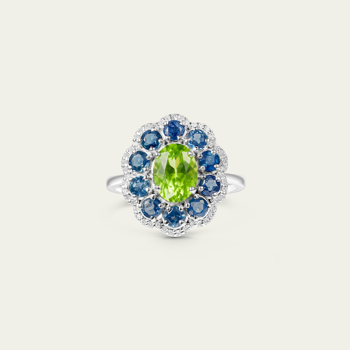 Marigold Peri Ring in 18K white gold, set with blue sapphire and peridot and diamond