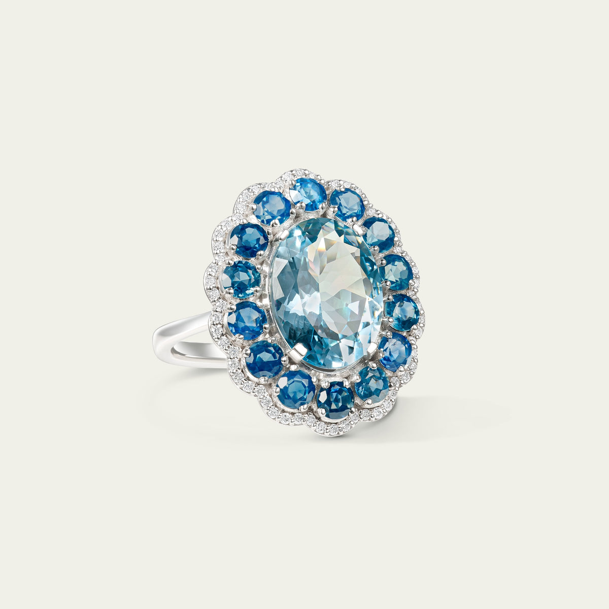 Marigold Aqua Ring in 18K white gold, set with blue sapphire and aquamarine and diamond