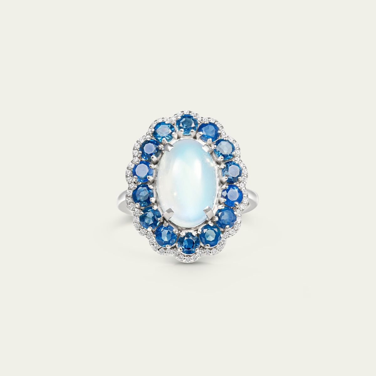 Marigold Moon Ring in 18K white gold, set with blue sapphire and moonstone and diamond