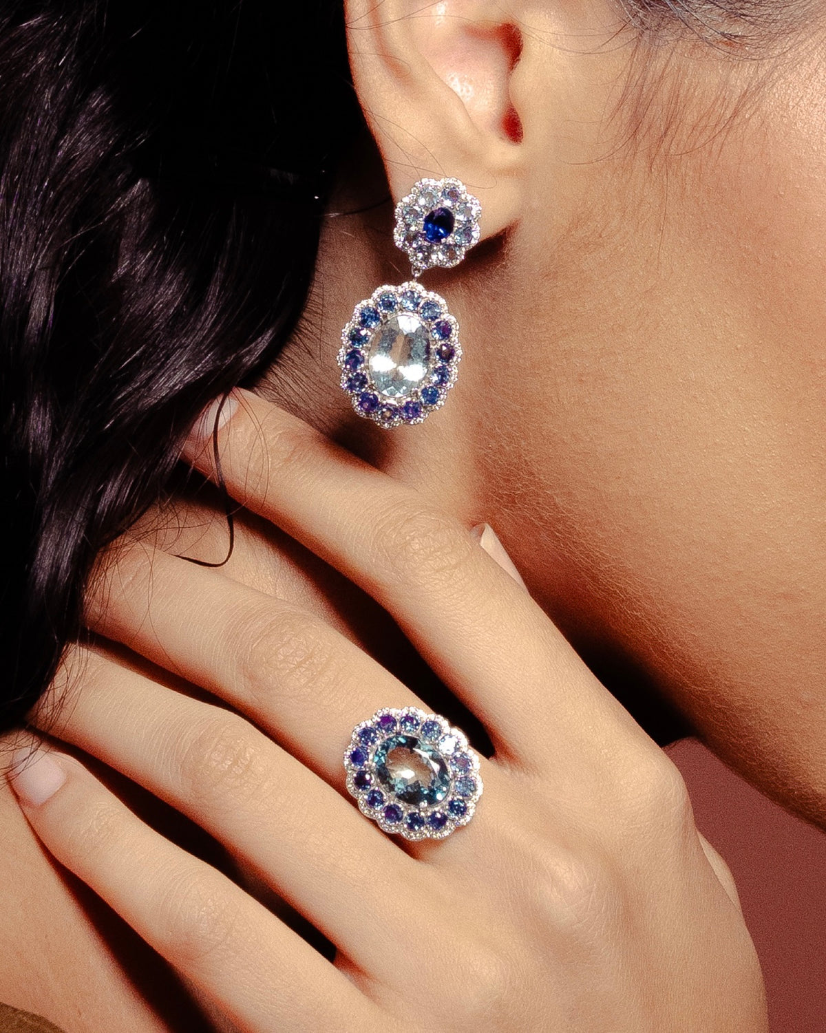 Model wearing the Anjus Marigold Aqua Earrings
