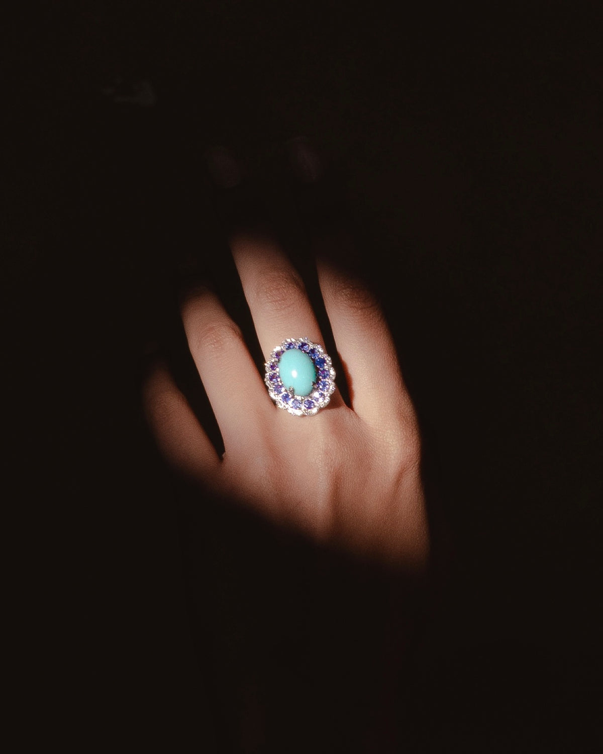 Close view of the Marigold Blue Ring in 18K white gold, blue sapphire and turquoise and diamond