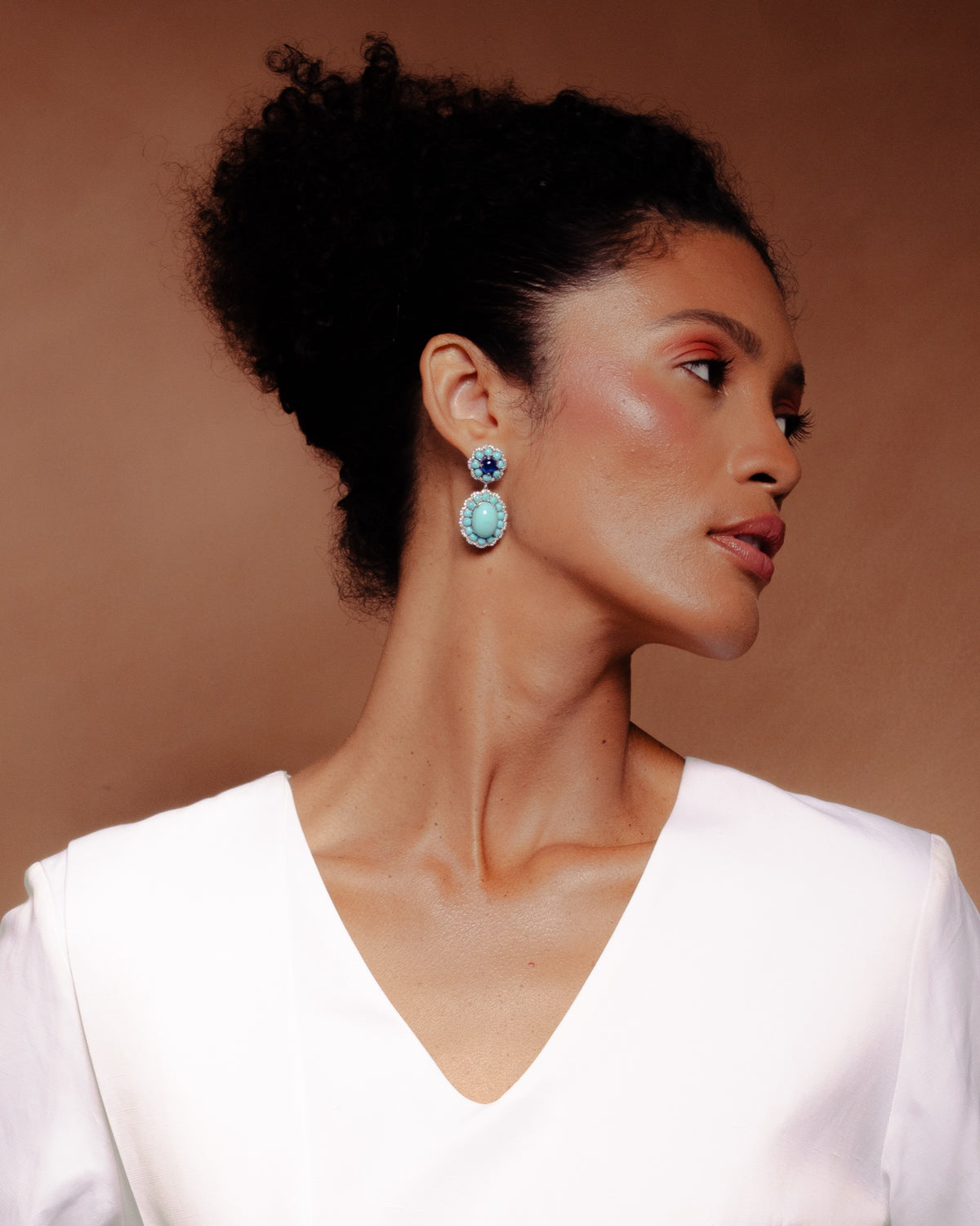 Model wearing the Anjus Marigold Firoza Earrings