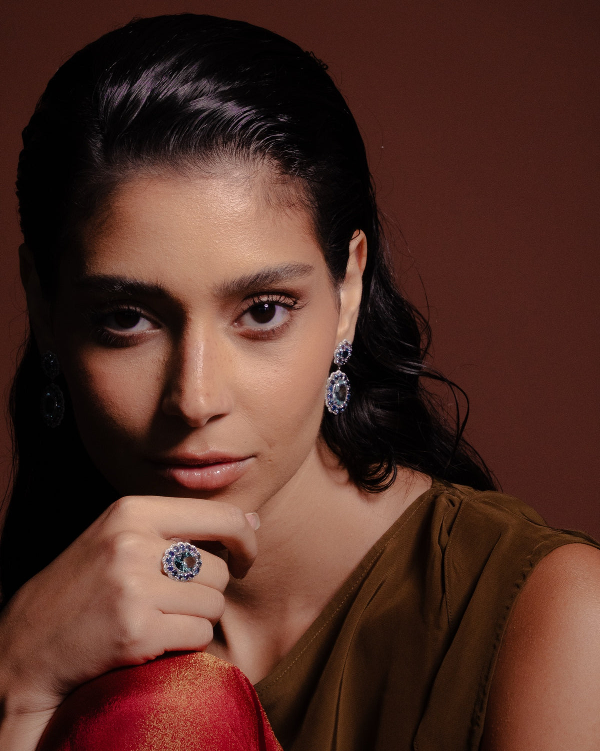Model wearing the Anjus Marigold Aqua Earrings