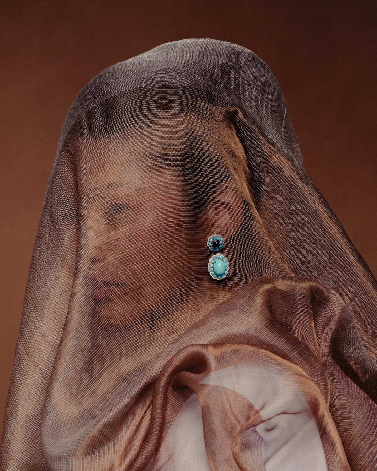 Model wearing the Anjus Marigold Firoza Earrings