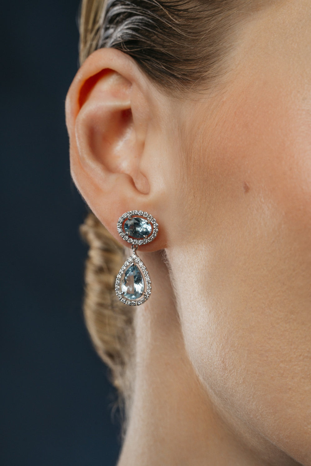 Primrose Bloom Aquamarine Drop Earrings on the model