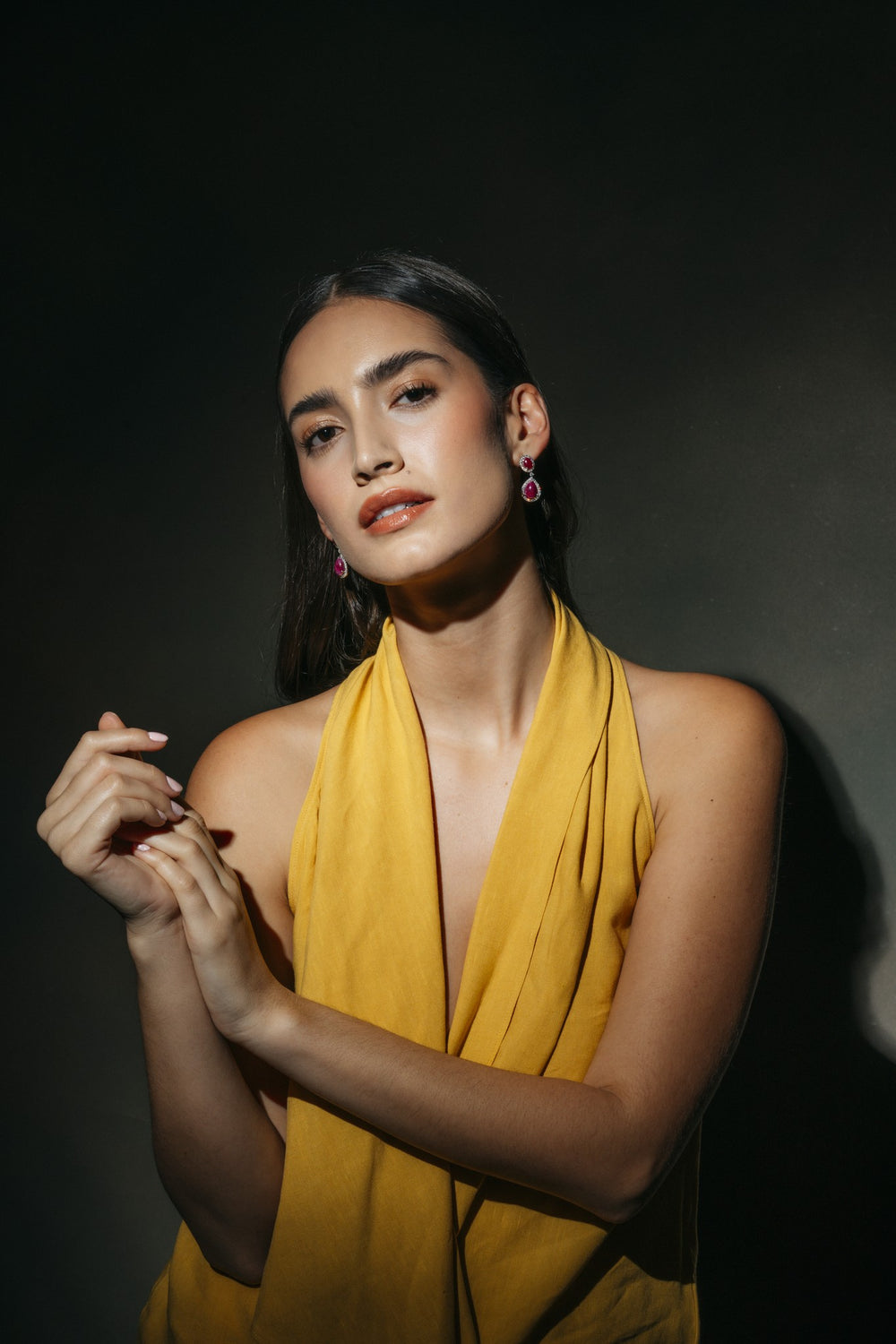Ruby Silk Cabochon Drop Earrings on the model
