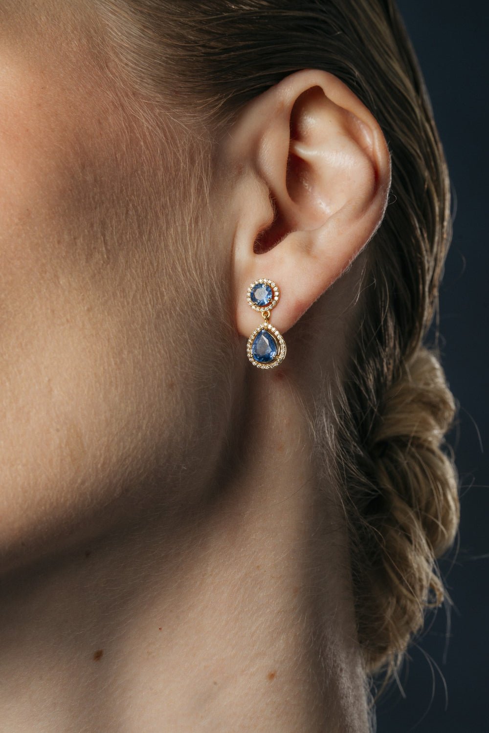 Blue Hour Round Sapphire Drop Earrings on the model